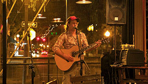 Saratoga Musician entertaining at night.